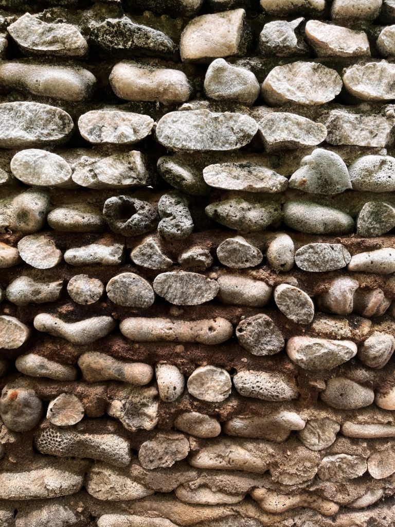 Coral stone wall.